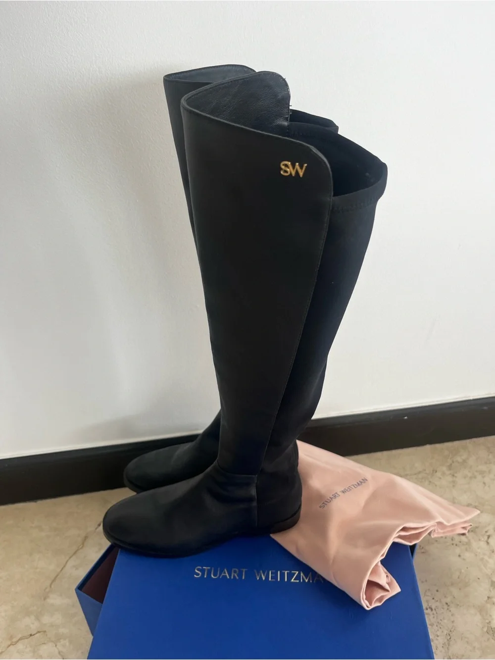 Stuart Weitzman Black Over-the-Knee Stretch Boots with Gold SW Emblem